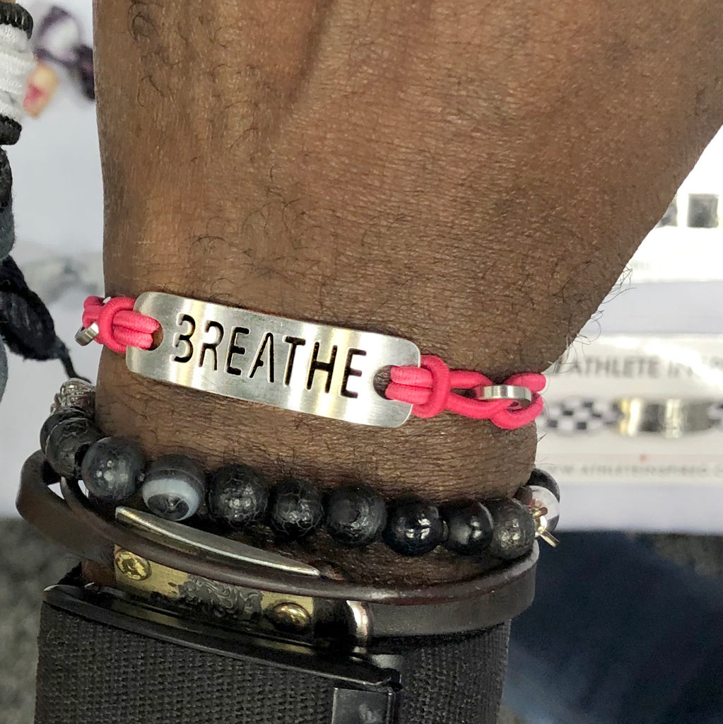 Strength, Courage, Believe, Breathe, Hope, Inspire, Live & Dream - Available in Black or Pink adjustable stretchy bracelet.  